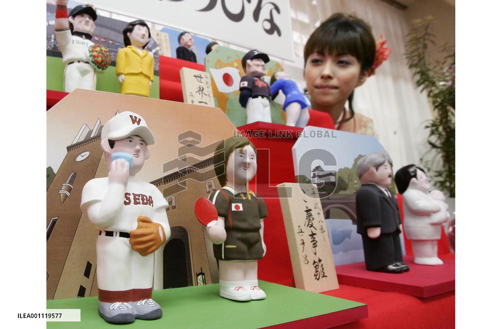Dolls depicting year's newsmakers shown in Tokyo