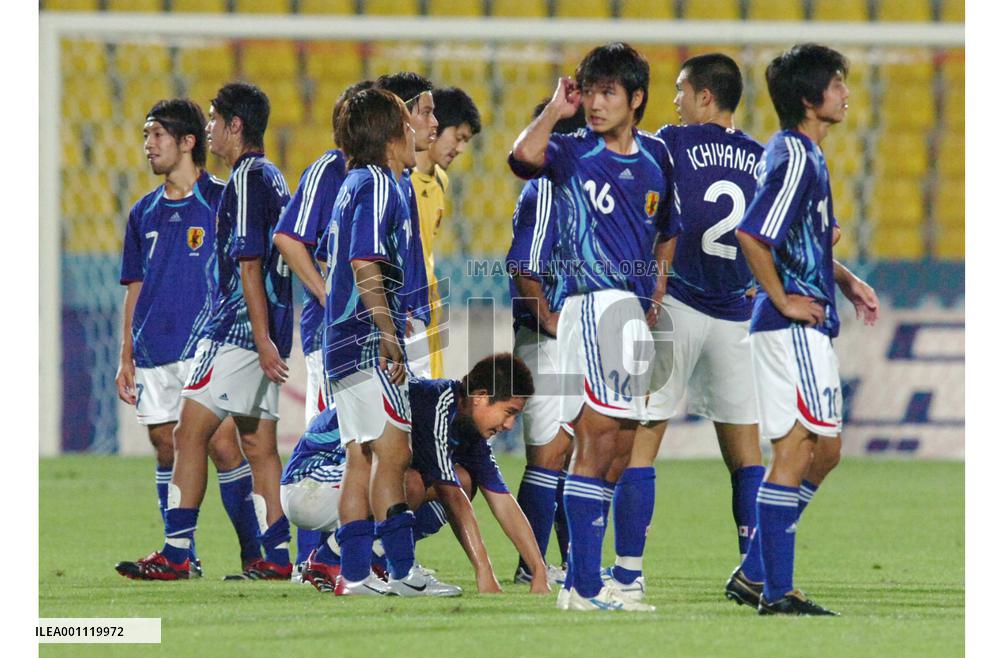 Japan crash out of soccer tourney