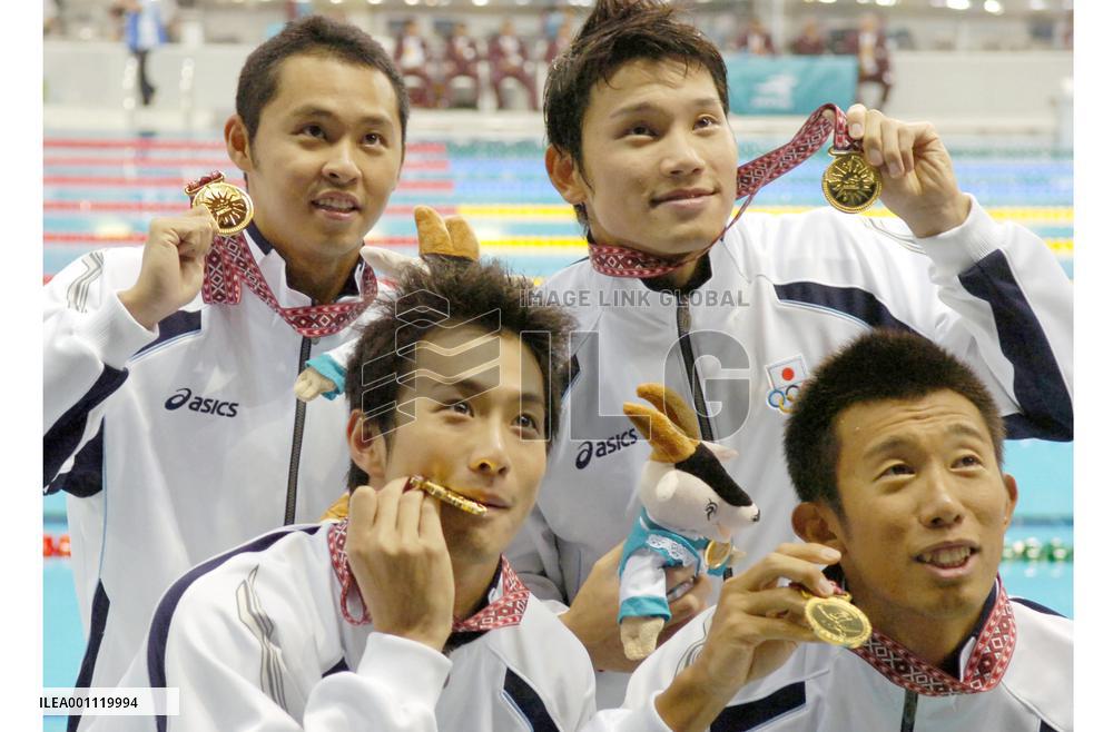 Japan wins 4th straight title in men's 4x100 medley relay