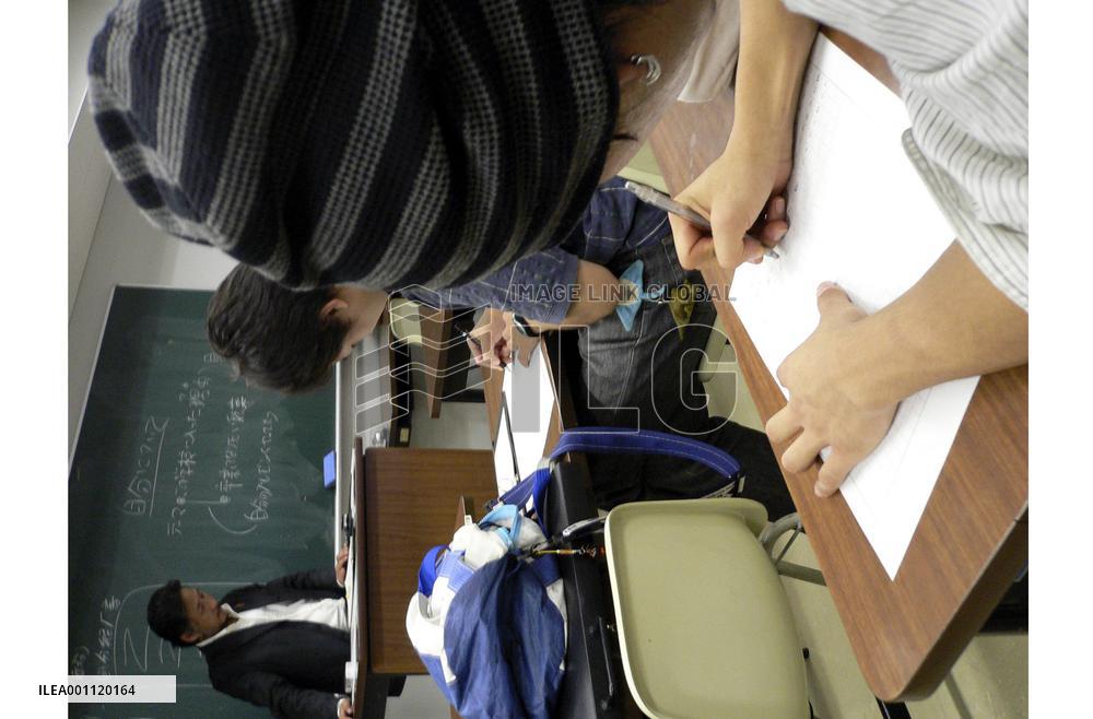 Young people writing personal histories for job-hunting