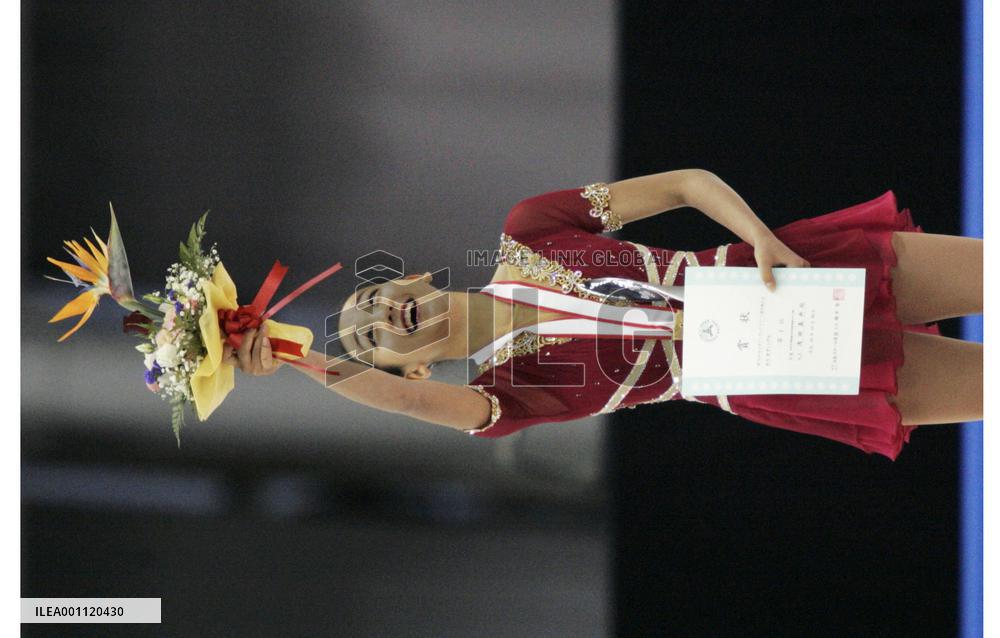 Asada wins 1st national title