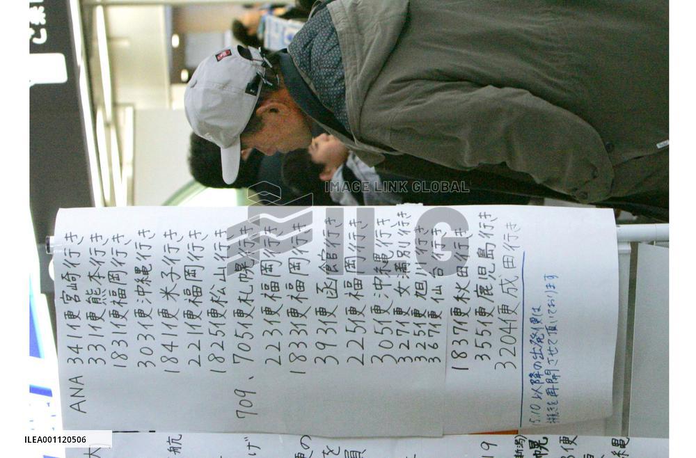 Stormy weather grounds flights, snow delays bullet trains