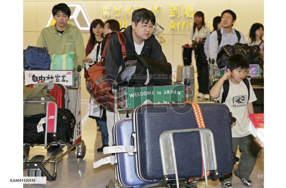 Return rush of holidaymakers peaks at Narita airport
