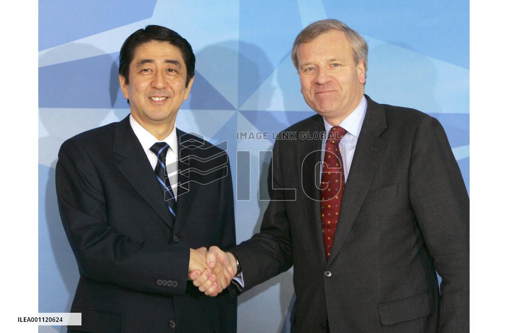 Abe tells NATO Japan won't shy from sending troops for int'l peace