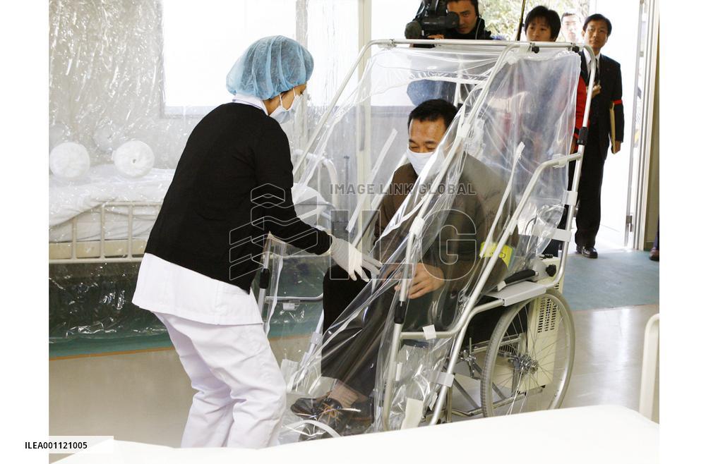 Central, local gov'ts hold drill to deal with potential new flu