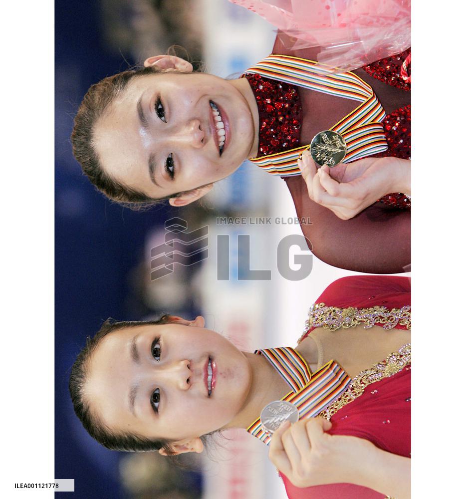 Ando wins title, Asada in 2nd at World Figure Skating