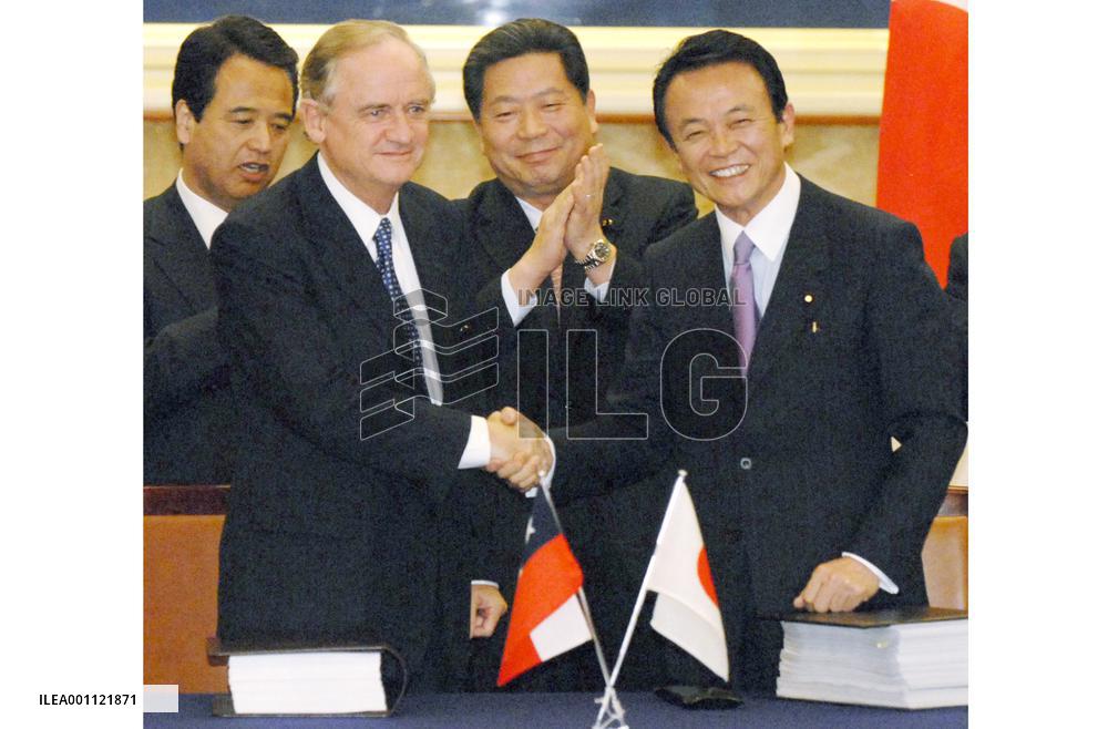 Japan inks free trade pact with Chile, 1st with S. American nation
