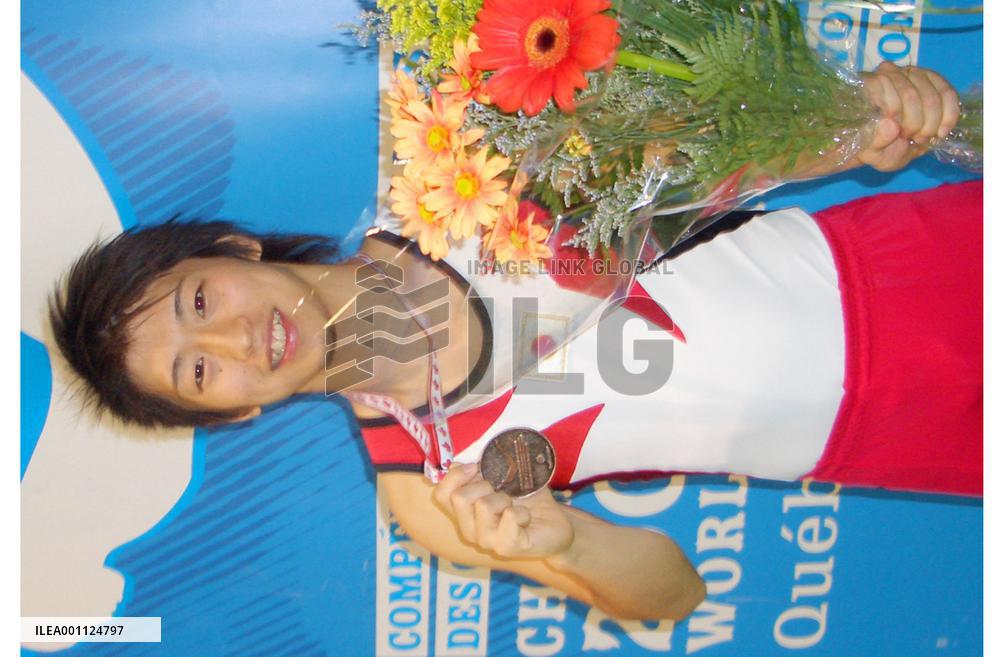 Japan's Ueyama gets bronze at worlds, Olympic berth