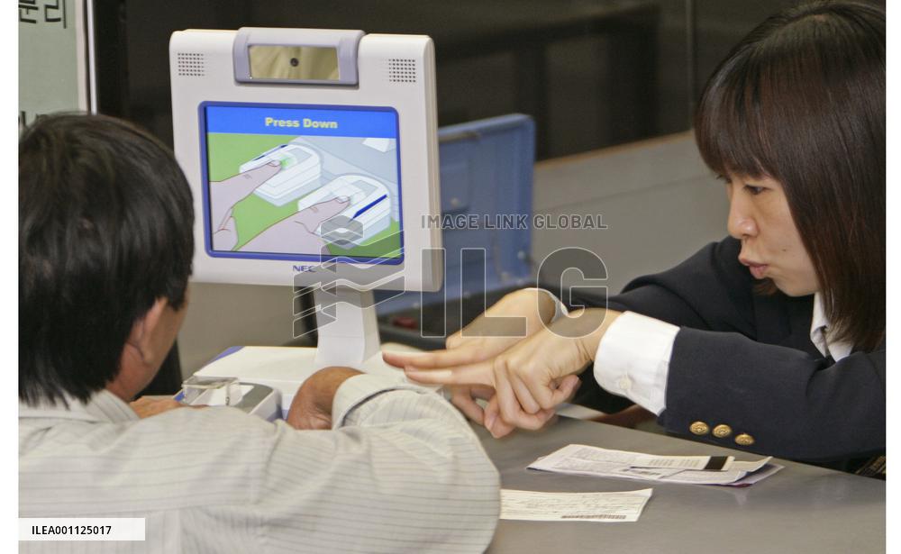 Japan begins fingerprinting, photographing foreigners