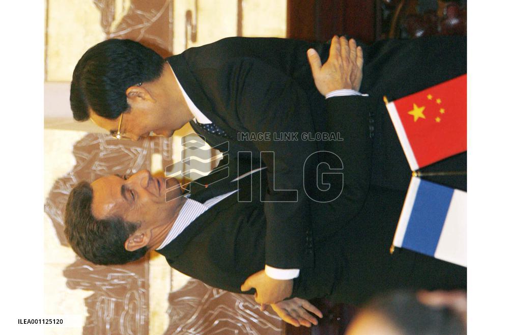 French president urges China to revalue currency