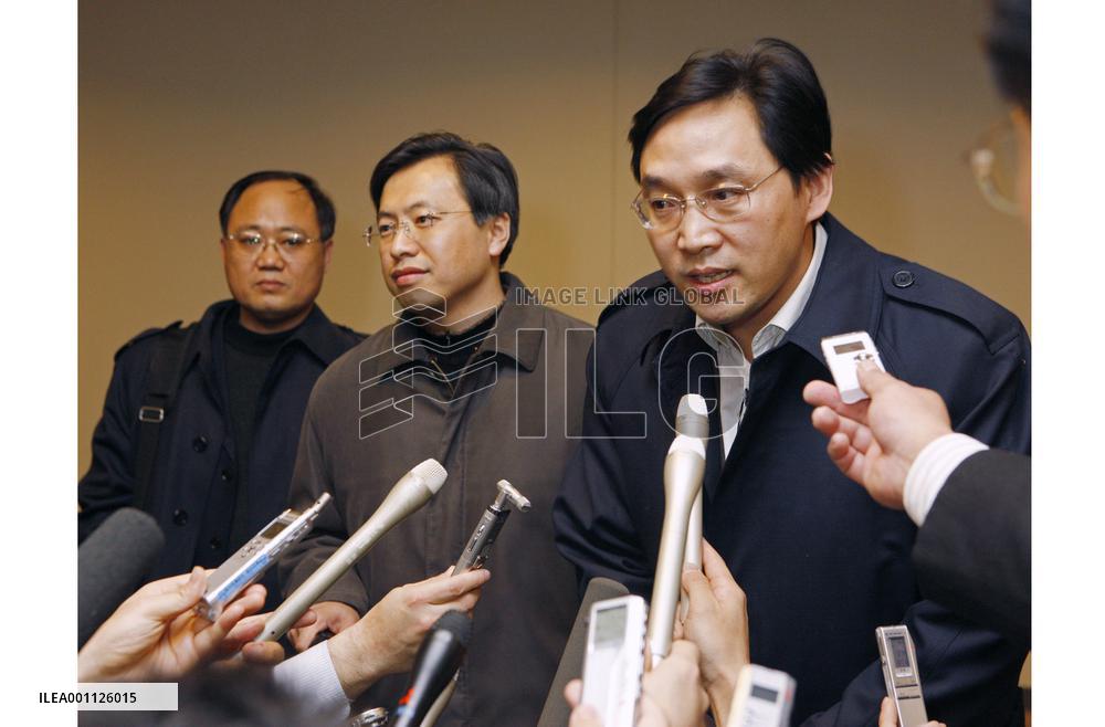 Chinese mission arrives in Japan over food-poisoning outbreak