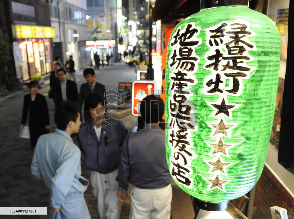 More pubs hanging green lanterns to advertise domestic fare
