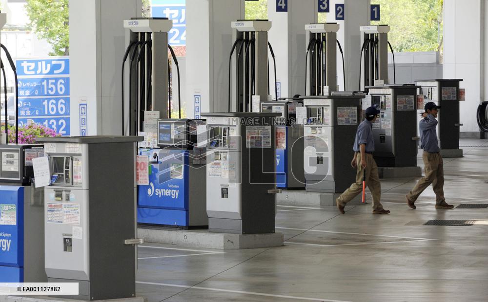 Gas stations start raising prices, tax surcharges reinstated