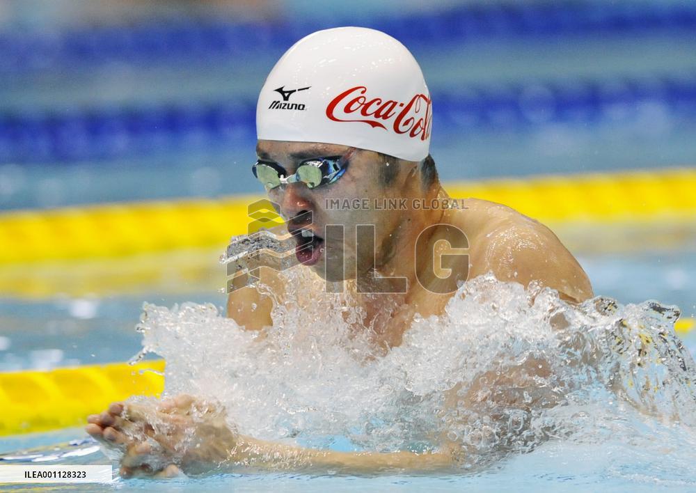 Kitajima sets 200-meter breaststroke world record