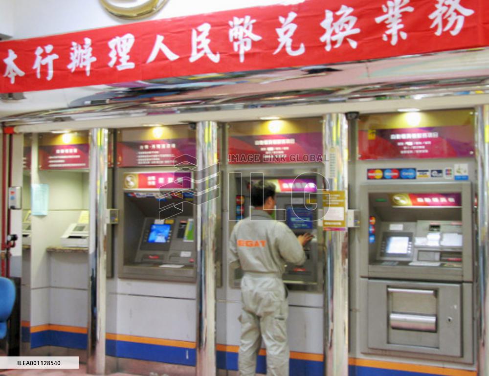 Taiwan starts exchanges between local dollar, Chinese yuan
