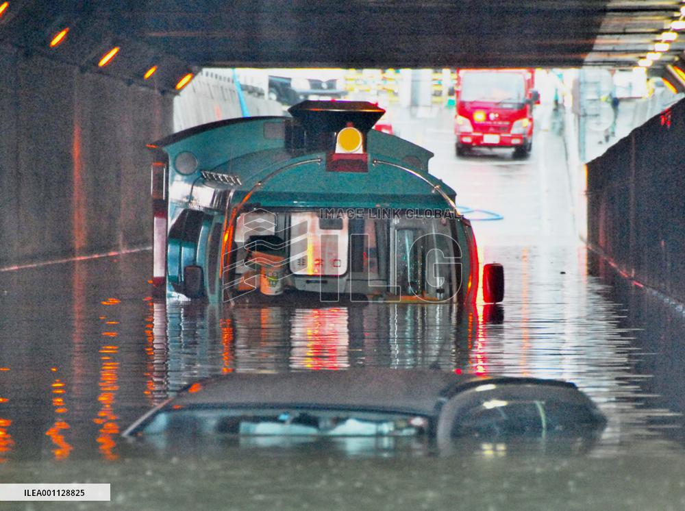 Bus submerged in flood in Kyoto
