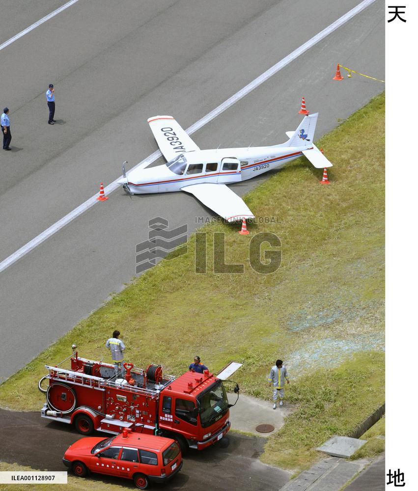 Small plane belly-lands at island airport in Tokyo, no one hurt