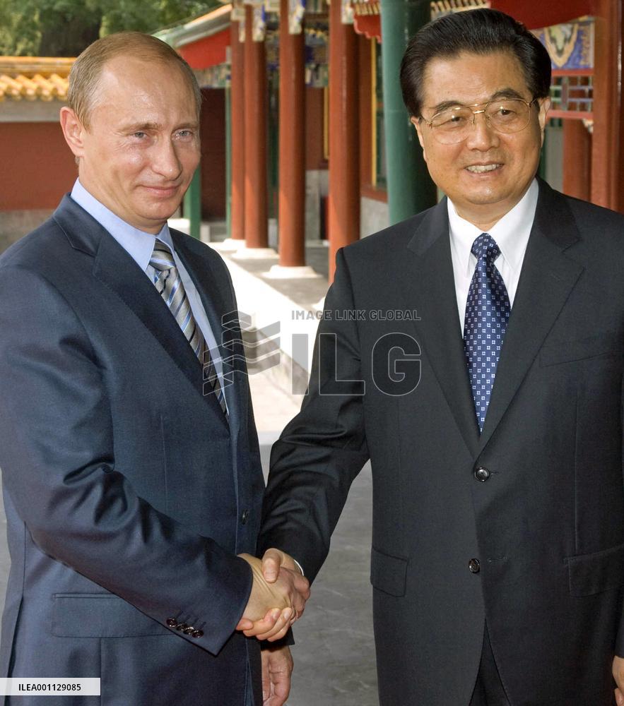 Olympics diplomacy: Hu Jintao meets Russia Prime Minister Putin