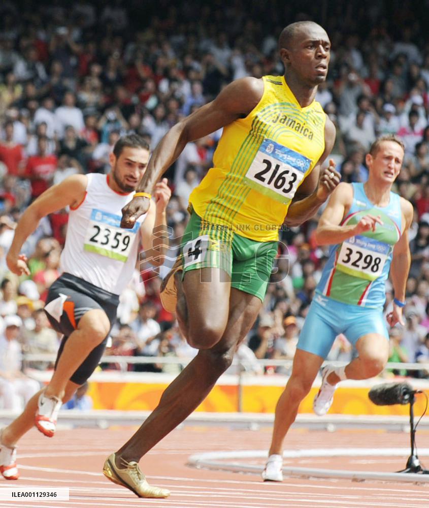 Jamaica's Bolt easily advances to 2nd-round 200-meter heat