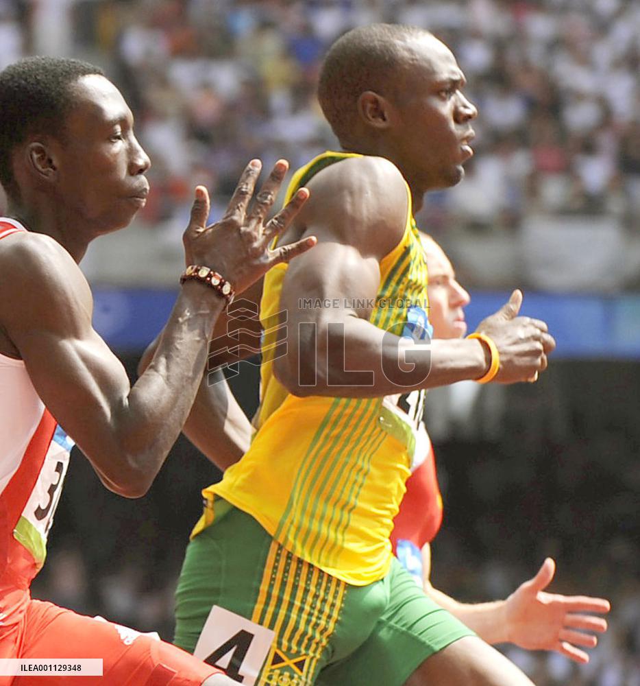 Jamaica's Bolt easily advances to 2nd-round 200-meter heat