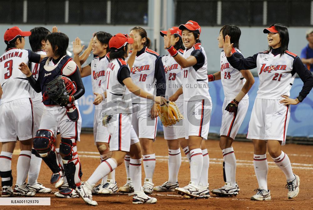 Japan rolls over Canada in final softball preliminary in Beijing