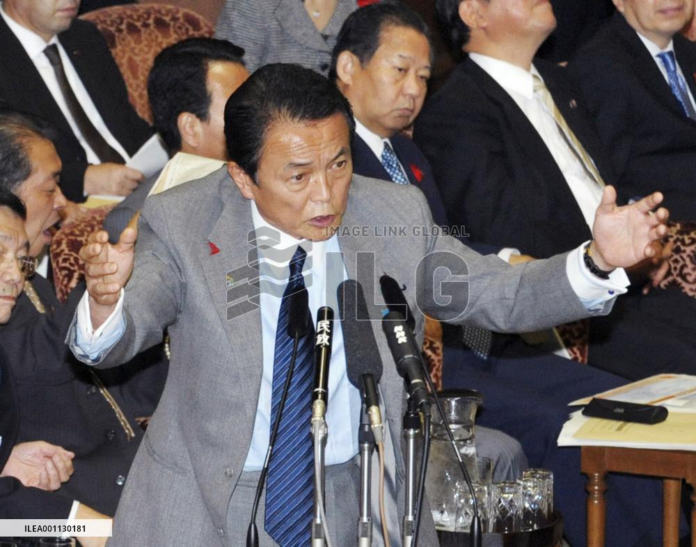 Aso expresses 'dissatisfaction' over U.S. delisting of N. Korea