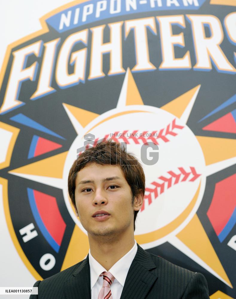 Nippon Ham ace Darvish signs 270 million yen deal