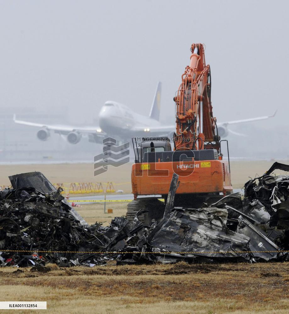 Narita reopens main Runway A after removing cargo plane wreckage