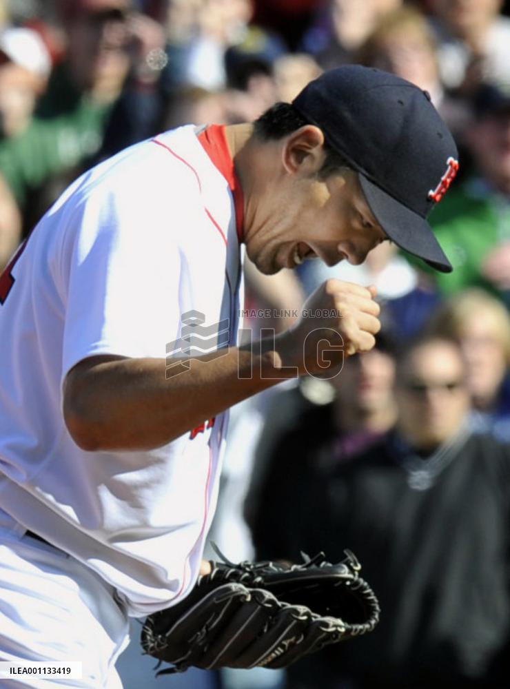 Red Sox's Saito earns his first save against Orioles