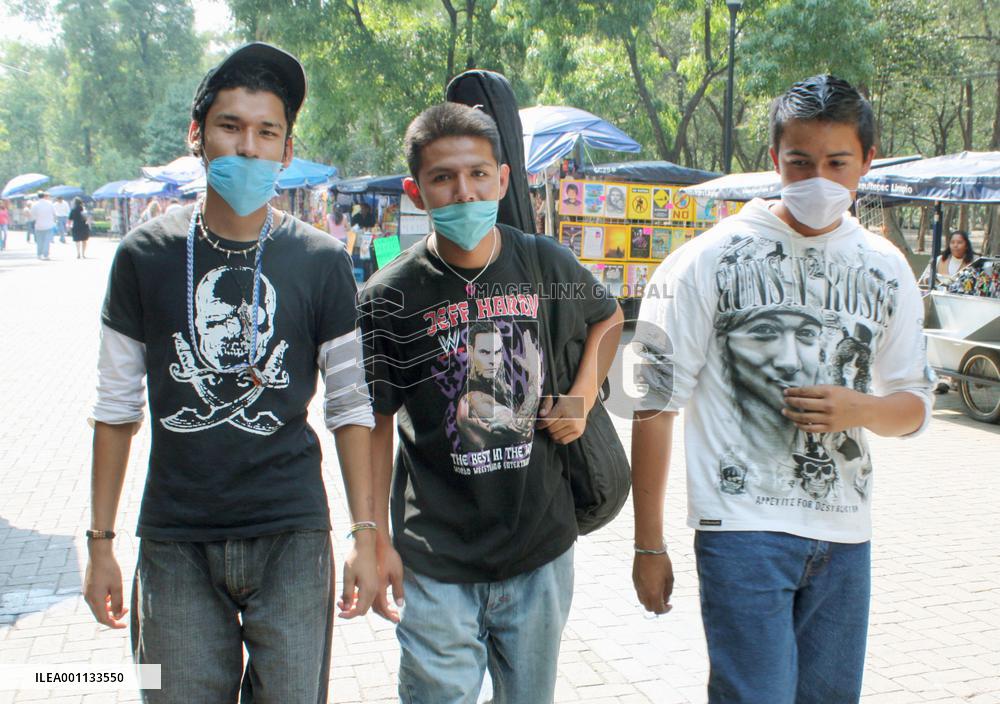 People wear masks following swine flu outbreak