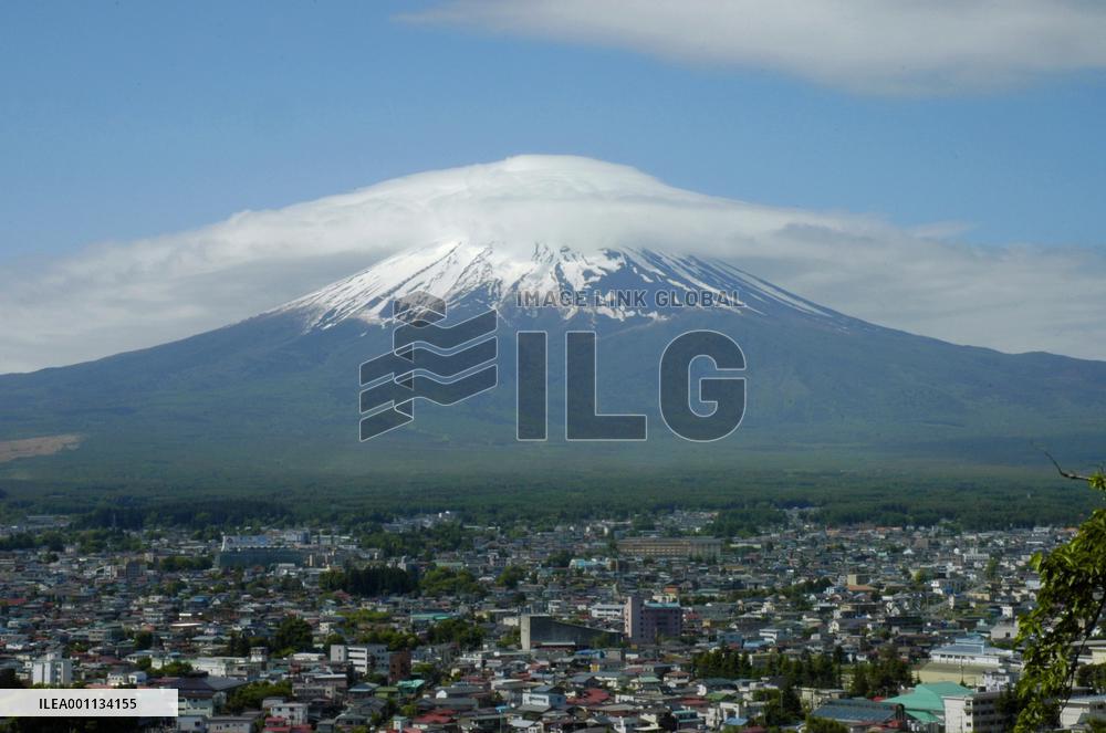 Mt. Fuji capped with crest cloud