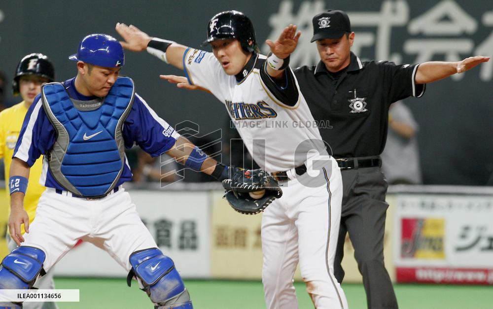 Nippon Ham's Takahashi signals safe