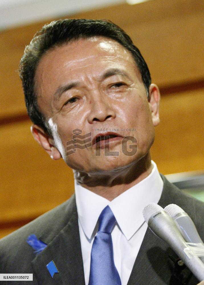 Aso changes Cabinet lineup, retains party leaders