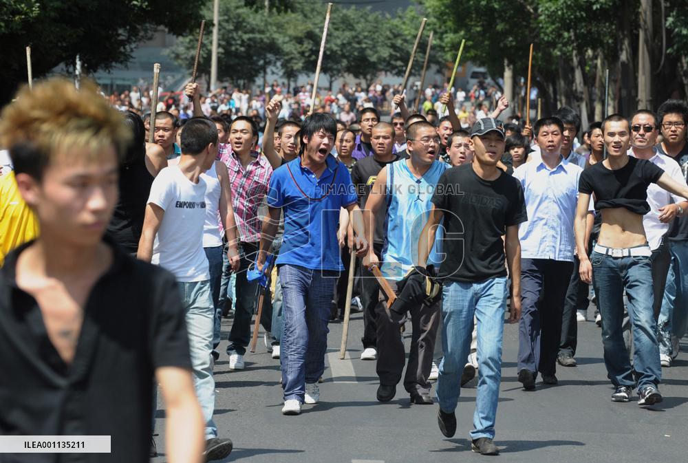 Curfew imposed in Xinjiang capital as violence grows