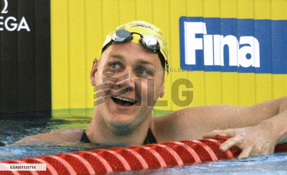 Brenton Rickard wins men's 100m breaststroke