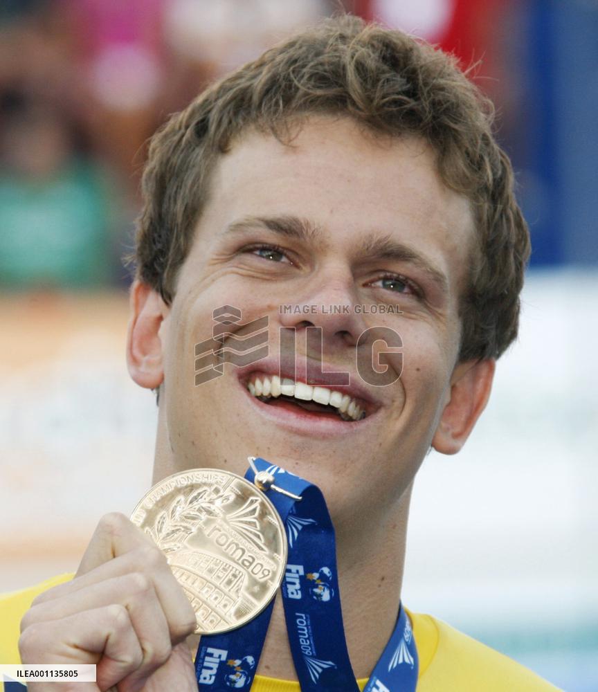 Brazil's Cielo wins men's 100m freestyle with world record