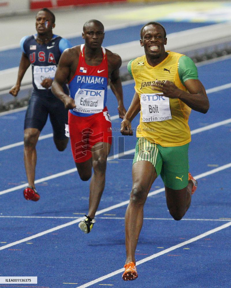 Bolt wins men's 200-m with new world record