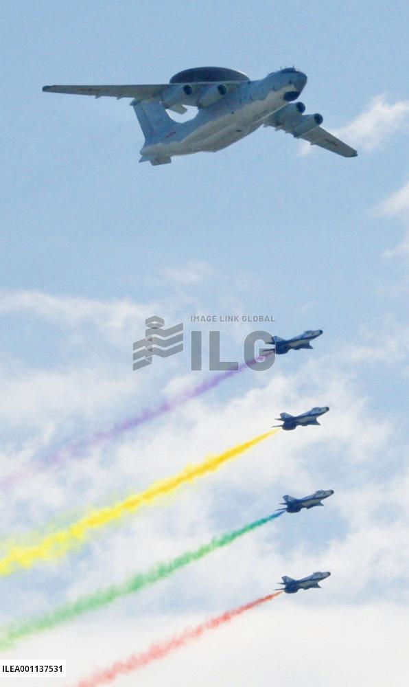 Beijing shows off new weaponry in 60th anniversary parade