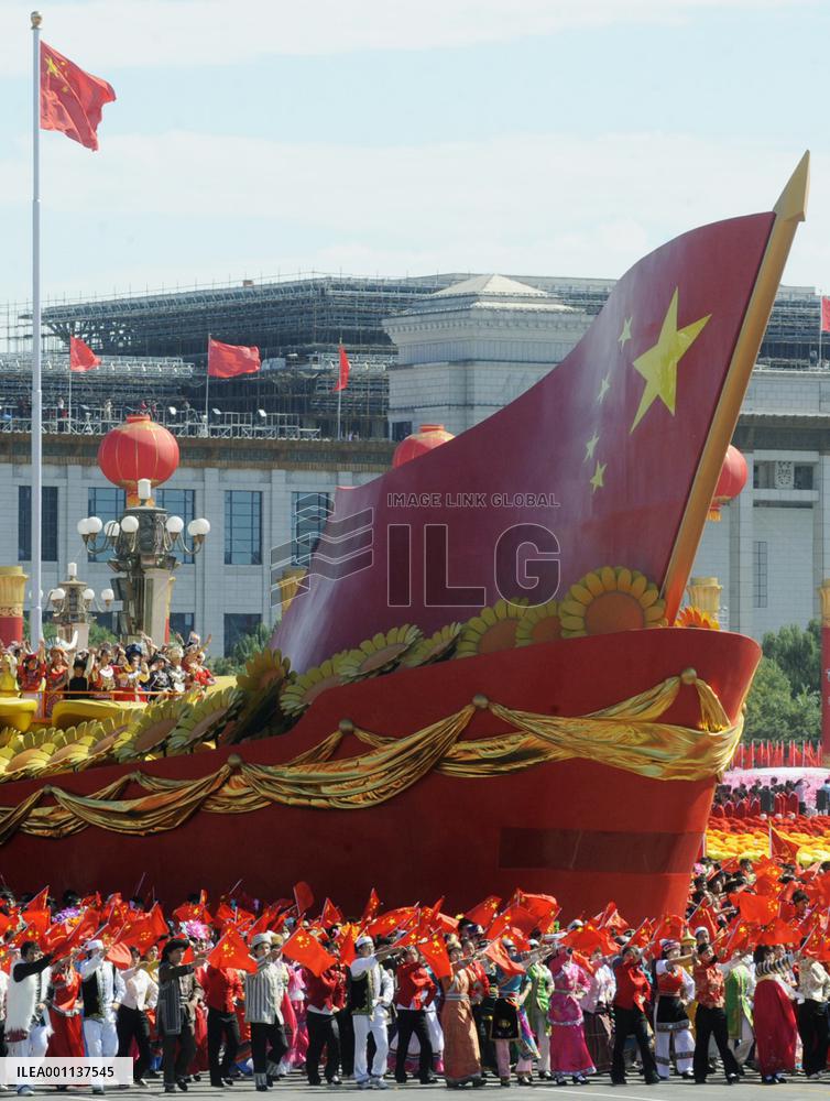 Beijing shows off new weaponry in 60th anniversary parade