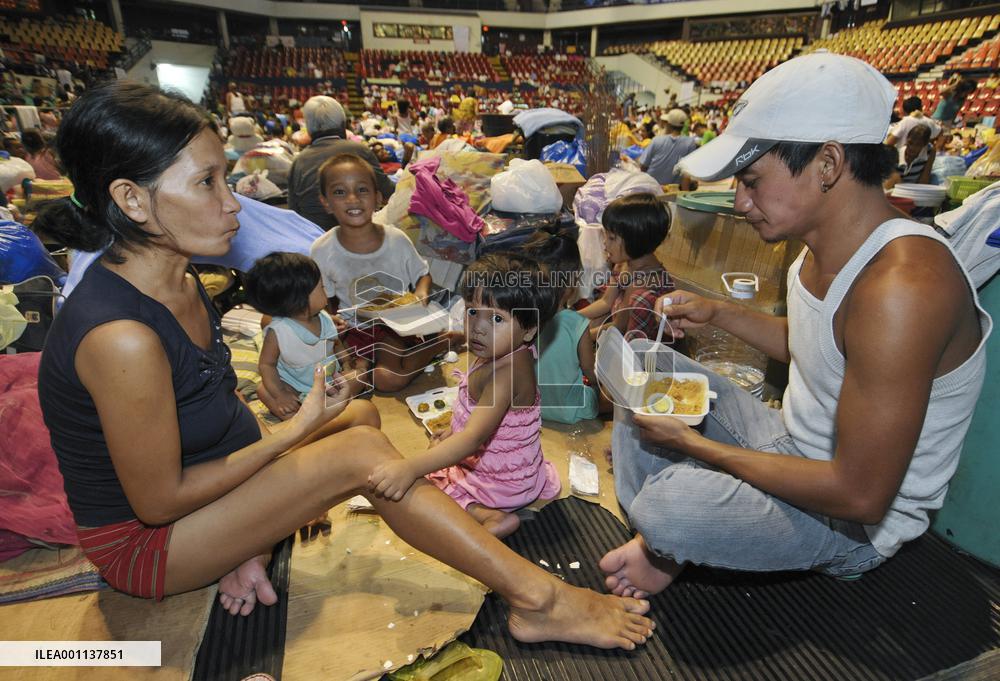 Evacuees after typhoons in Philippines