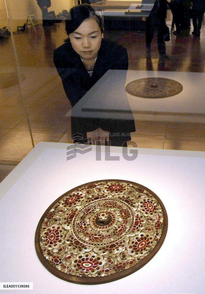 Round decorative mirror in Nara's repository