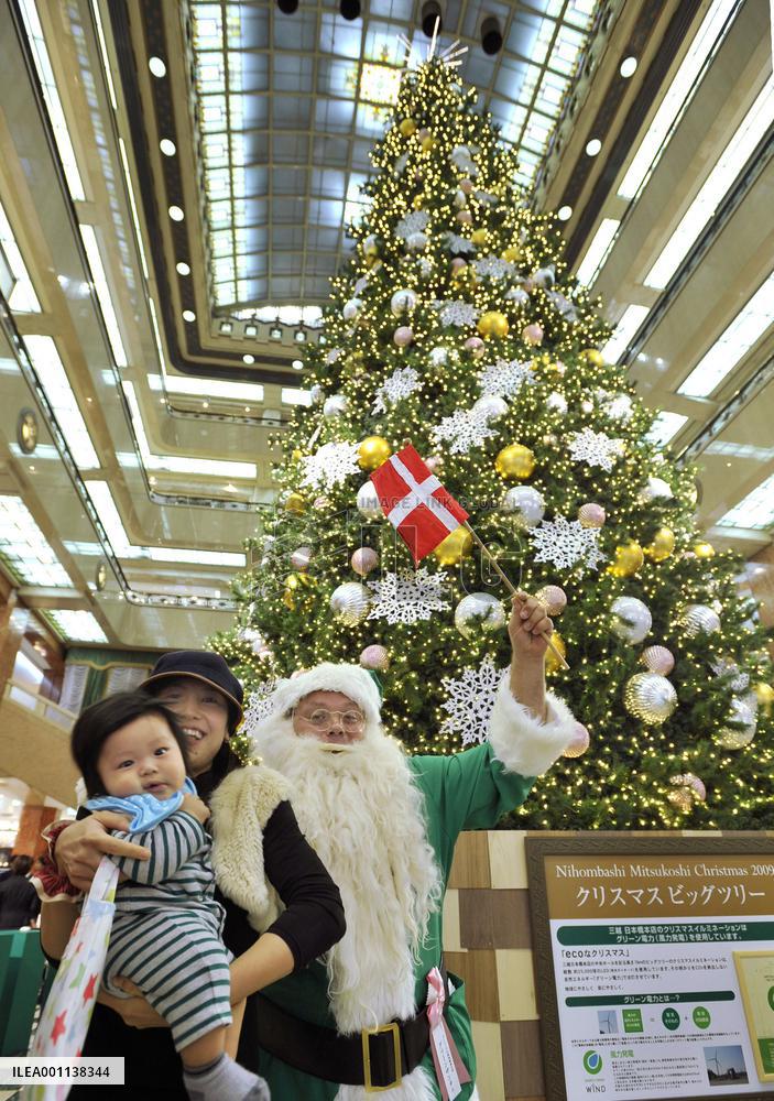 15-m tall Christmas tree lights up Tokyo department store