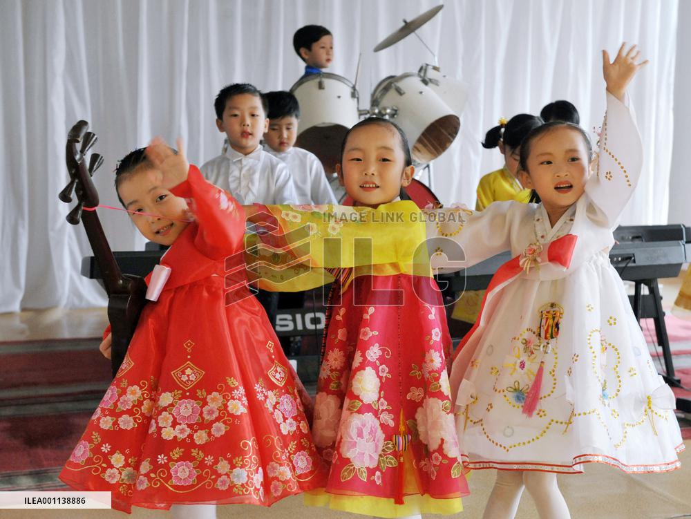 Children perform music at nursery