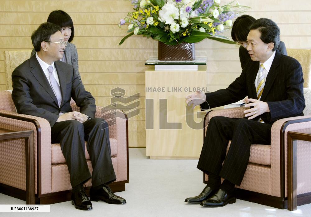 Yang, Hatoyama meet
