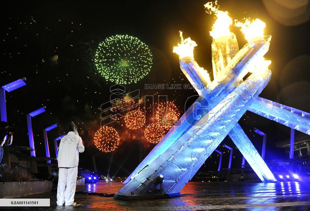 Olympic flame lit at opening ceremony