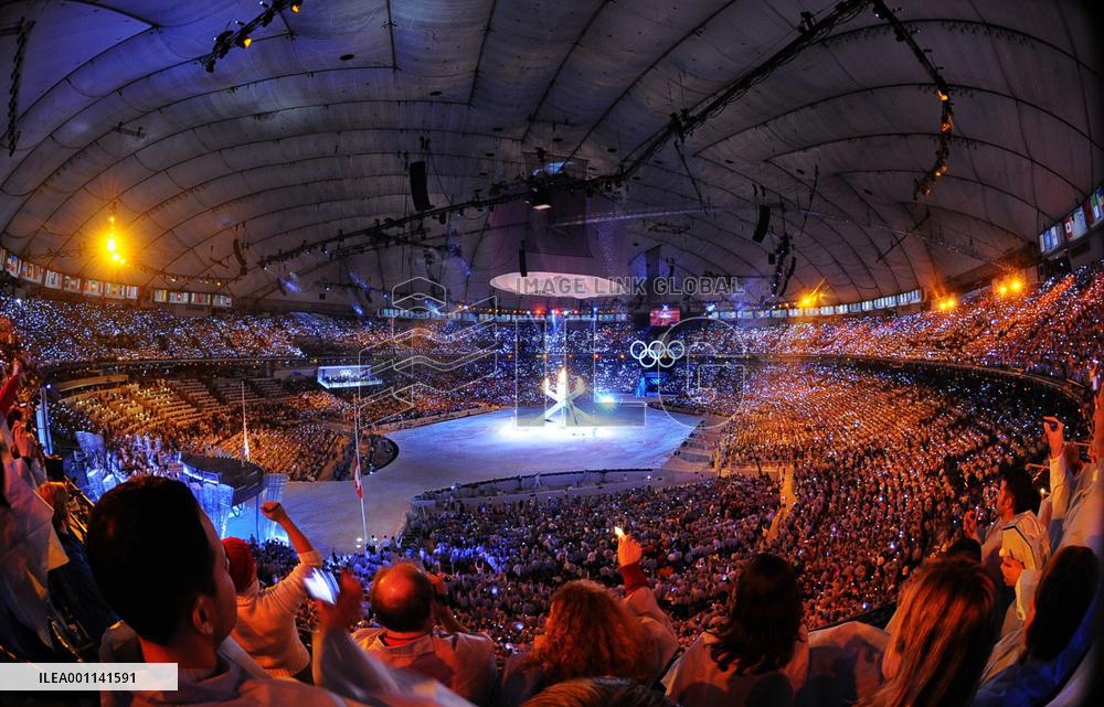 Olympic flame lit at opening ceremony