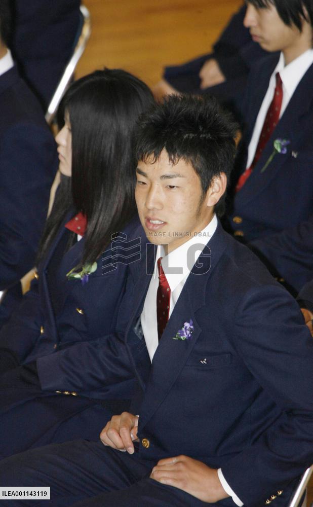 Lions Kikuchi attends high school commencement