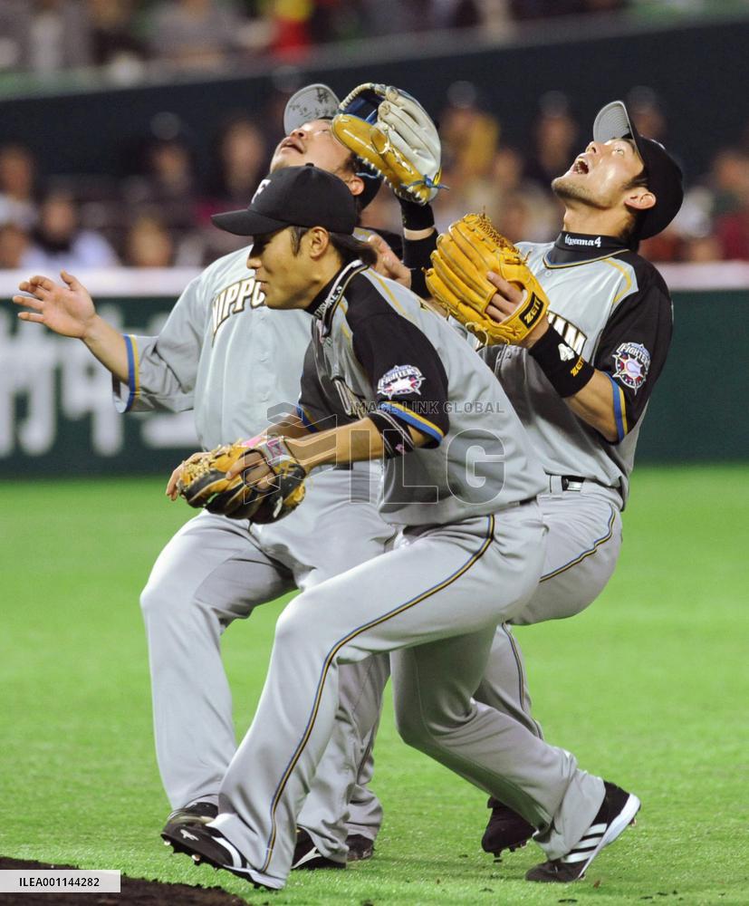 Fighters infielders collide