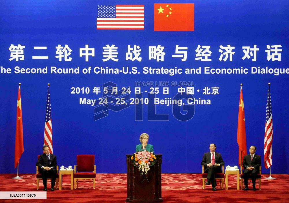 U.S., China begin talks, focus on N. Korea, yuan