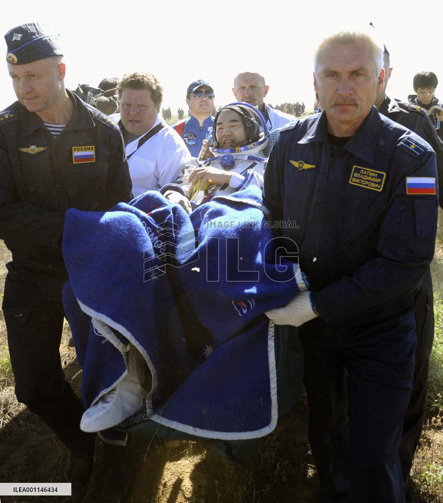 Noguchi returns to Earth